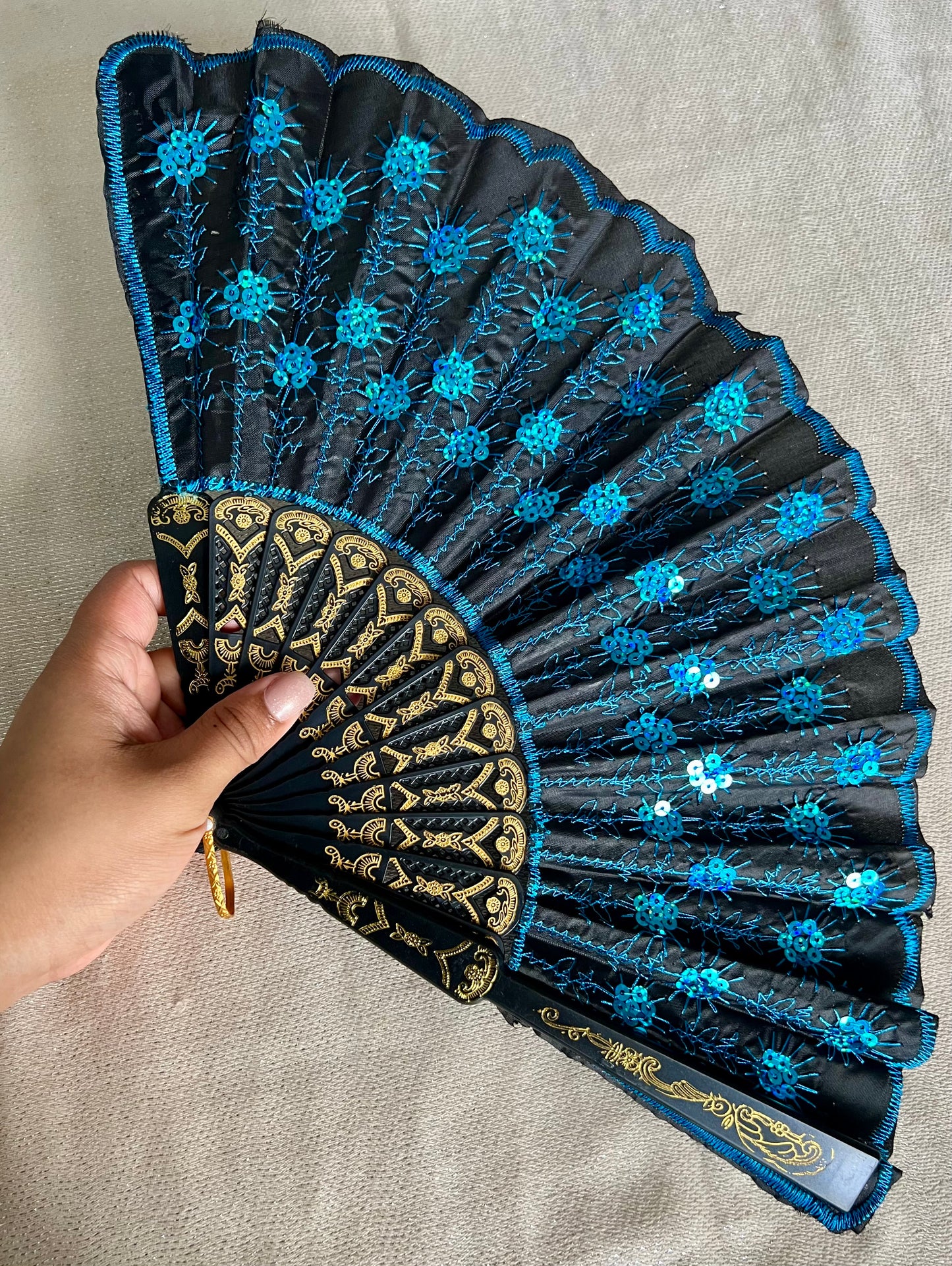 Abanico de mano - azul turquesa