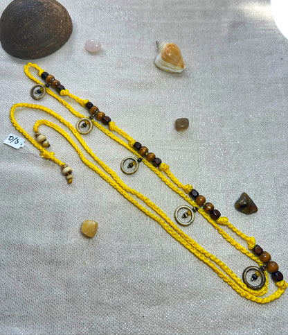 Accesorio de cintura amarillo y huesos (O/S)